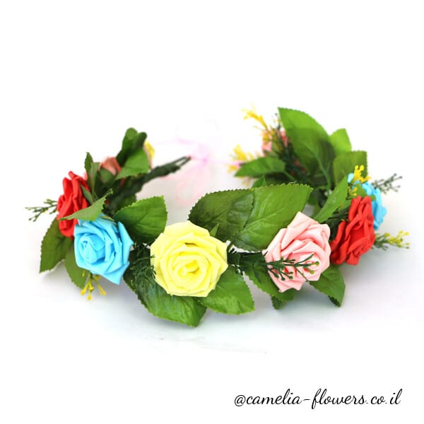 A colorful flower crown on a white background available for delivery from a flower shop.